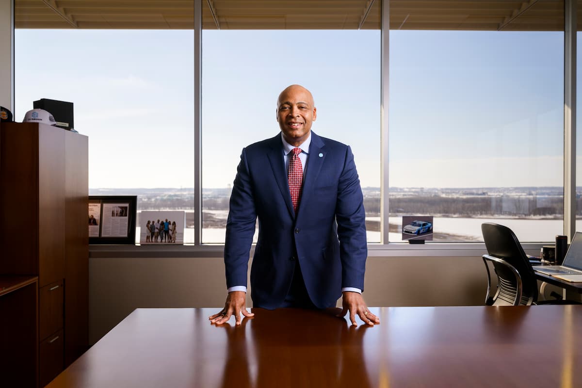 Dave Bozeman, C.H. Robinson CEO standing behind desk
