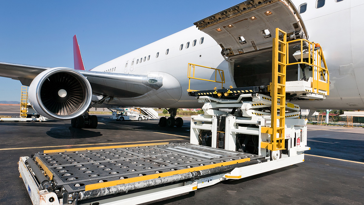 Airplane with cargo being loaded in