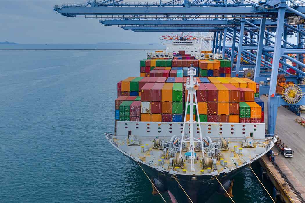 Container ship at port ready for ocean freight sailing