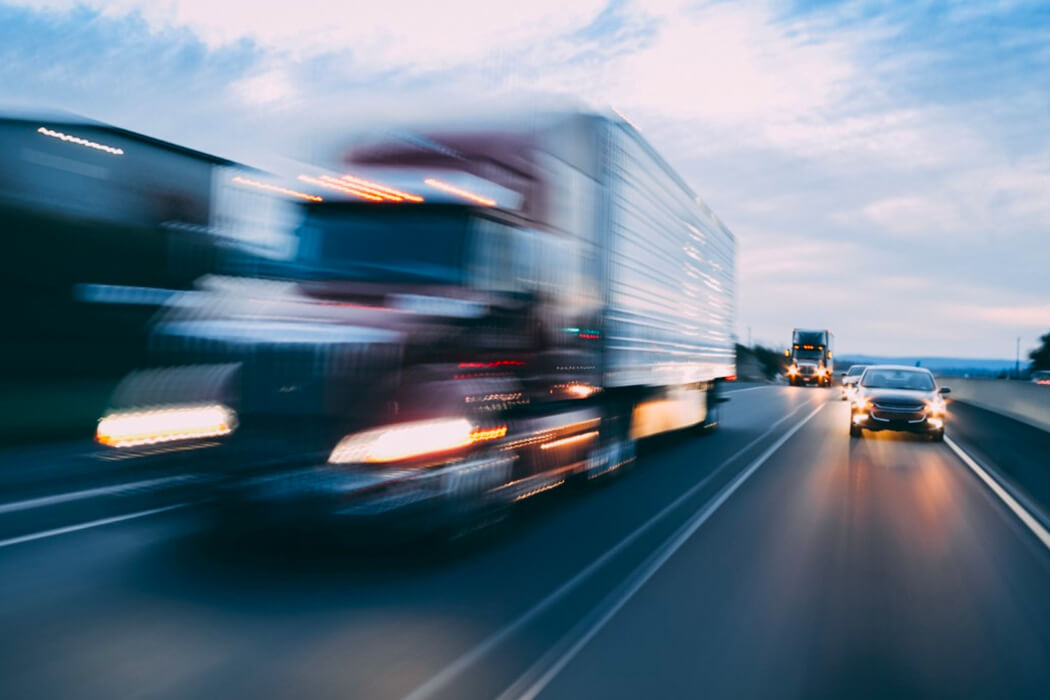 Blurred truck: expedited truckload shipping
