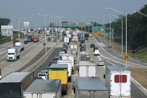 Long line of carriers in traffic