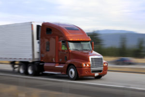 Truck with red cab. ELD mandate and what shippers need to know